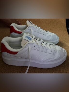 New Balance White Sneakers with Red Heel and Blue Logo